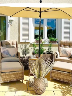 Clearance Beliani Set salotto da giardino con tavolo e pouf 2 posti PONZA Rattan sintetico (PE) Beige Beige Naturale