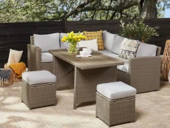 Beliani Set salotto da giardino con tavolo e pouf 5 posti BARDI con cuscini Rattan sintetico (PE) Tortora Beige Naturale Grigio