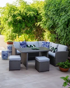 Beliani Set salotto da giardino con tavolo e pouf 5 posti BARDI con cuscini Rattan sintetico (PE) Tortora Beige Naturale Grigio