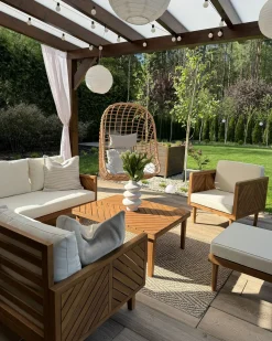 Beliani Set salotto da giardino con tavolo e pouf 5 posti BARATTI Legno d'acacia Marrone Beige Marrone