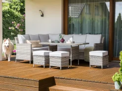Discount Beliani Set salotto da giardino con tavolo e pouf 9 posti LACONA Lato destro Rattan sintetico (PE) chiaro Grigio