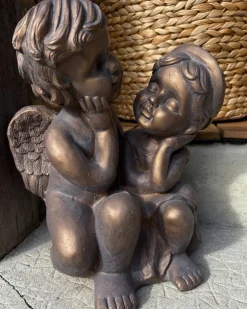 Beliani Statuetta da giardino DAMARO Bambini Marrone