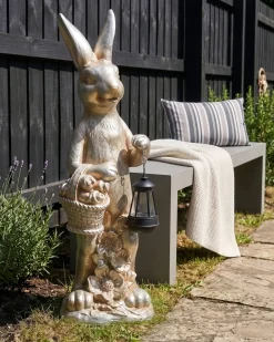 Beliani Statuetta da giardino OTTERUP Coniglio Oro Oro Argento