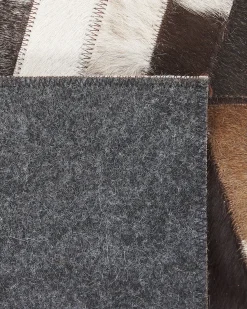 Hot Beliani Tappeto AKYELE Marrone Pelle naturale Bianco Marrone Multicolore