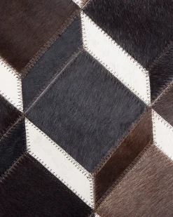 Best Beliani Tappeto ALPKOY Marrone Pelle naturale Bianco Marrone Nero