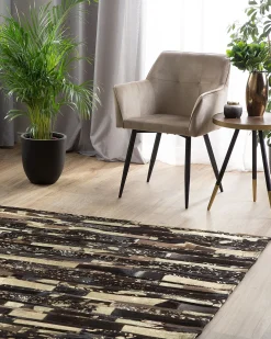 Outlet Beliani Tappeto ARTVIN Marrone Pelle naturale Marrone Nero Oro