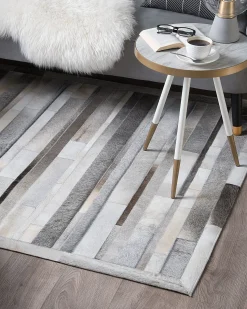 New Beliani Tappeto AZAY Grigio chiaro 140 x 200 cm Pelle naturale Beige Marrone Grigio