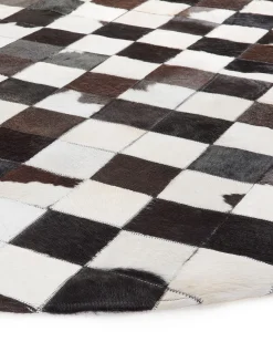 Hot Beliani Tappeto BERGAMA Marrone ø 140 cm Pelle naturale Bianco Nero