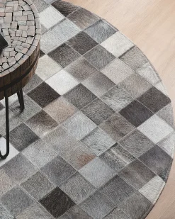 Outlet Beliani Tappeto BERGAMA Marrone ø 140 cm Pelle naturale Marrone Grigio