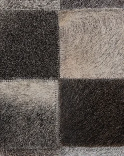 Outlet Beliani Tappeto BERGAMA Marrone ø 140 cm Pelle naturale Marrone Grigio