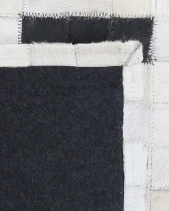 Hot Beliani Tappeto BOLU Nero Pelle naturale Bianco Nero