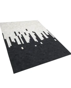 Hot Beliani Tappeto BOLU Nero Pelle naturale Bianco Nero