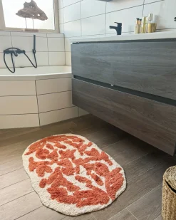 Outlet Beliani Tappeto da bagno DERIK Arancione 60 x 90 cm Cotone Beige Arancione