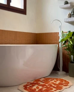 Outlet Beliani Tappeto da bagno DERIK Arancione 60 x 90 cm Cotone Beige Arancione
