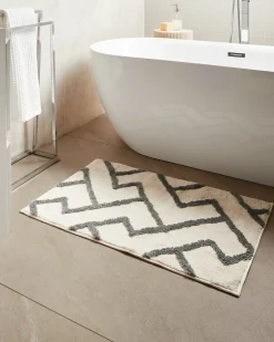 Beliani Tappeto da bagno GARHI Beige 60 x 90 cm Cotone Beige Grigio