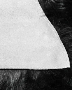 Discount Beliani Tappeto in pelliccia sintetica MUNGO 63 x 95 cm Nero