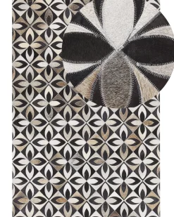 Outlet Beliani Tappeto ISHAN Multicolore 140 x 200 cm Pelle naturale Bianco Marrone Nero Multicolore