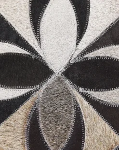 Outlet Beliani Tappeto ISHAN Multicolore 140 x 200 cm Pelle naturale Bianco Marrone Nero Multicolore
