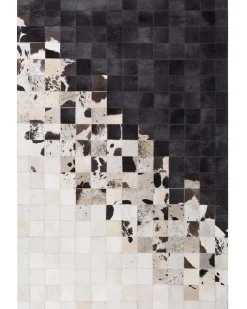 Sale Beliani Tappeto KEMAH Nero 140 x 200 cm Pelle naturale Bianco Nero