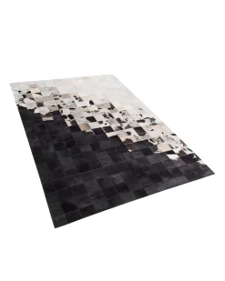 Sale Beliani Tappeto KEMAH Nero 140 x 200 cm Pelle naturale Bianco Nero