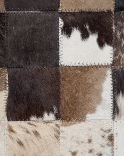 Clearance Beliani Tappeto OKCULU Marrone 140 x 200 cm Pelle naturale Beige Marrone Nero