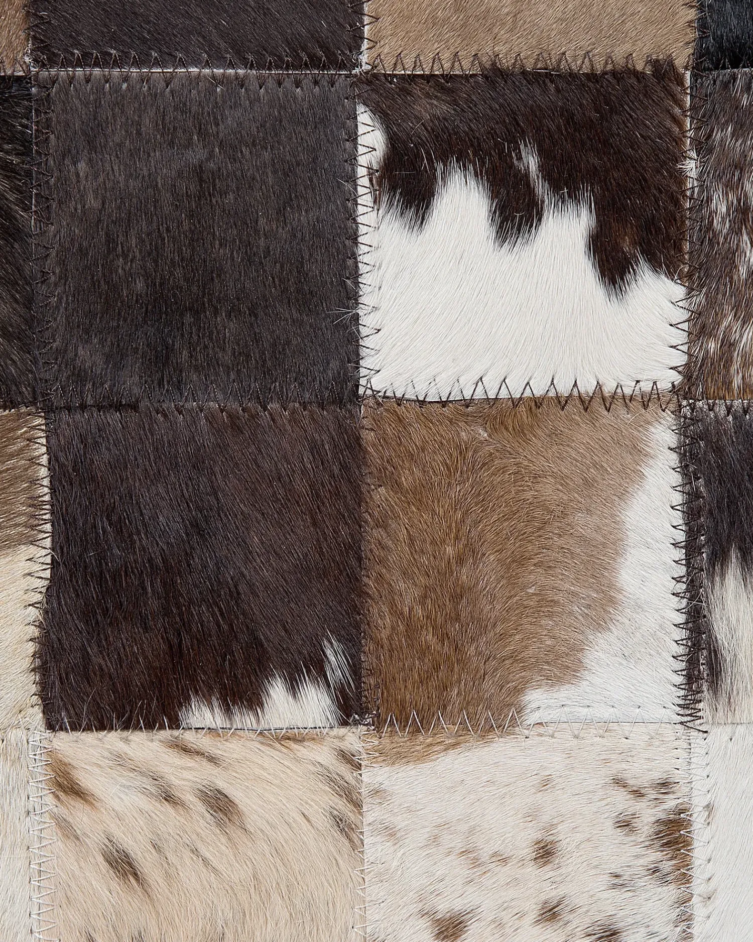 Clearance Beliani Tappeto OKCULU Marrone 140 x 200 cm Pelle naturale Beige Marrone Nero