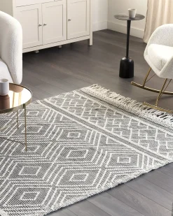Beliani Tappeto SAVUCA Nero 160 x 230 cm Lana Bianco Nero