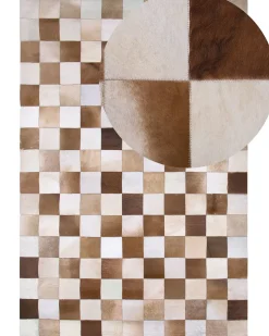 Beliani Tappeto SOLMAZ Beige 140 x 200 cm Pelle naturale Beige Marrone