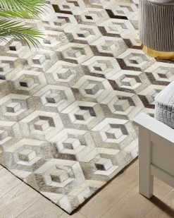 Outlet Beliani Tappeto TAVAK Beige Pelle naturale Beige Marrone