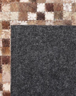 Outlet Beliani Tappeto TORUL Marrone Pelle naturale Beige Marrone
