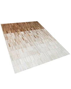 Outlet Beliani Tappeto YAGDA Beige 140 x 200 cm Pelle naturale Beige Marrone
