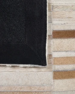 Outlet Beliani Tappeto YAGDA Beige 140 x 200 cm Pelle naturale Beige Marrone