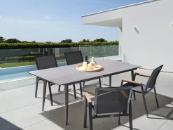 Clearance Beliani Tavolo da pranzo da giardino TOLENTINO 180 cm 90 cm Effetto pietra Effetto travertino Beige Grigio