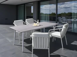 Beliani Tavolo da pranzo da giardino TOLENTINO 180 cm 90 cm Effetto pietra Effetto travertino Beige Bianco