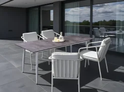 Outlet Beliani Tavolo da pranzo da giardino TOLENTINO 180 cm 90 cm Effetto pietra Grigio Bianco Grigio